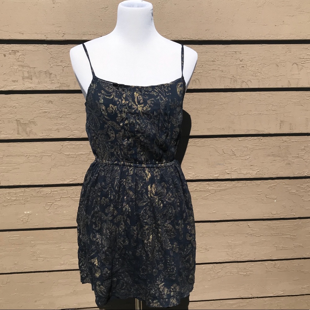 An navy blue and gold Abercrombie and Fitch dress.